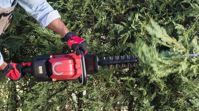 Close up top view of Honda cordless hedge trimmer.
