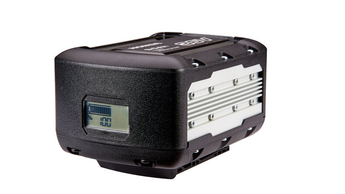 Close up of battery with digital charging display.
