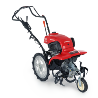 Motobineuse équipée d'outils rotatifs, de trois quarts face tournée vers la droite.