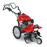 Motobineuse équipée d'outils rotatifs, de trois quarts face tournée vers la droite.