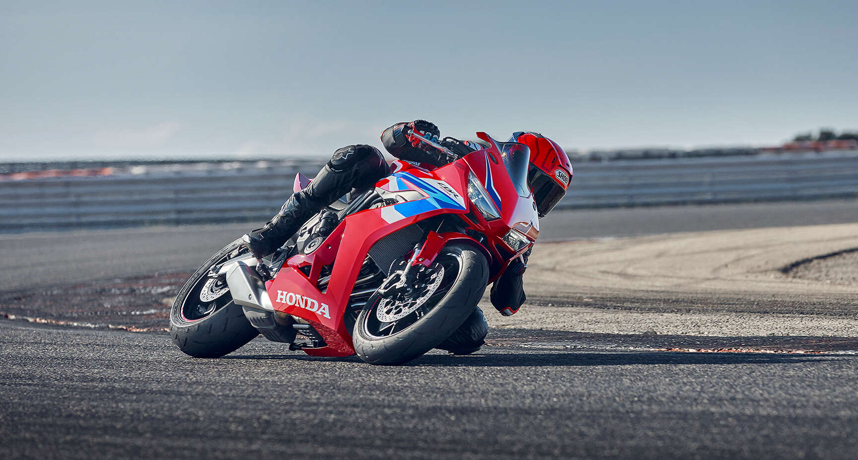 Honda CBR650R parked infront of garage